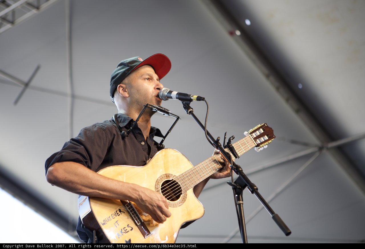 Tom Morello Rocks the Crowd with His Electric Guitar and Microphone