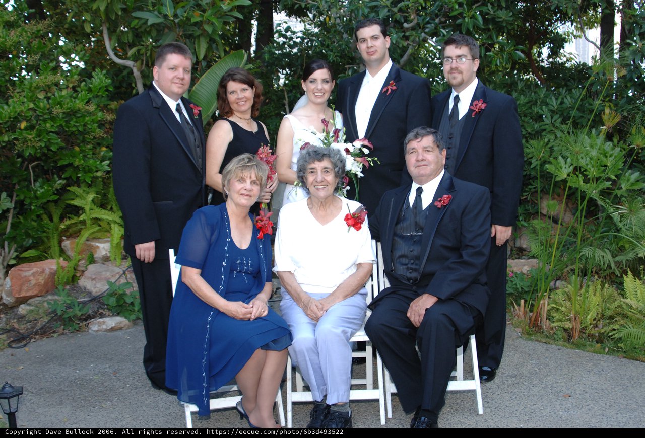 Family Wedding Portrait in Lush Garden Setting