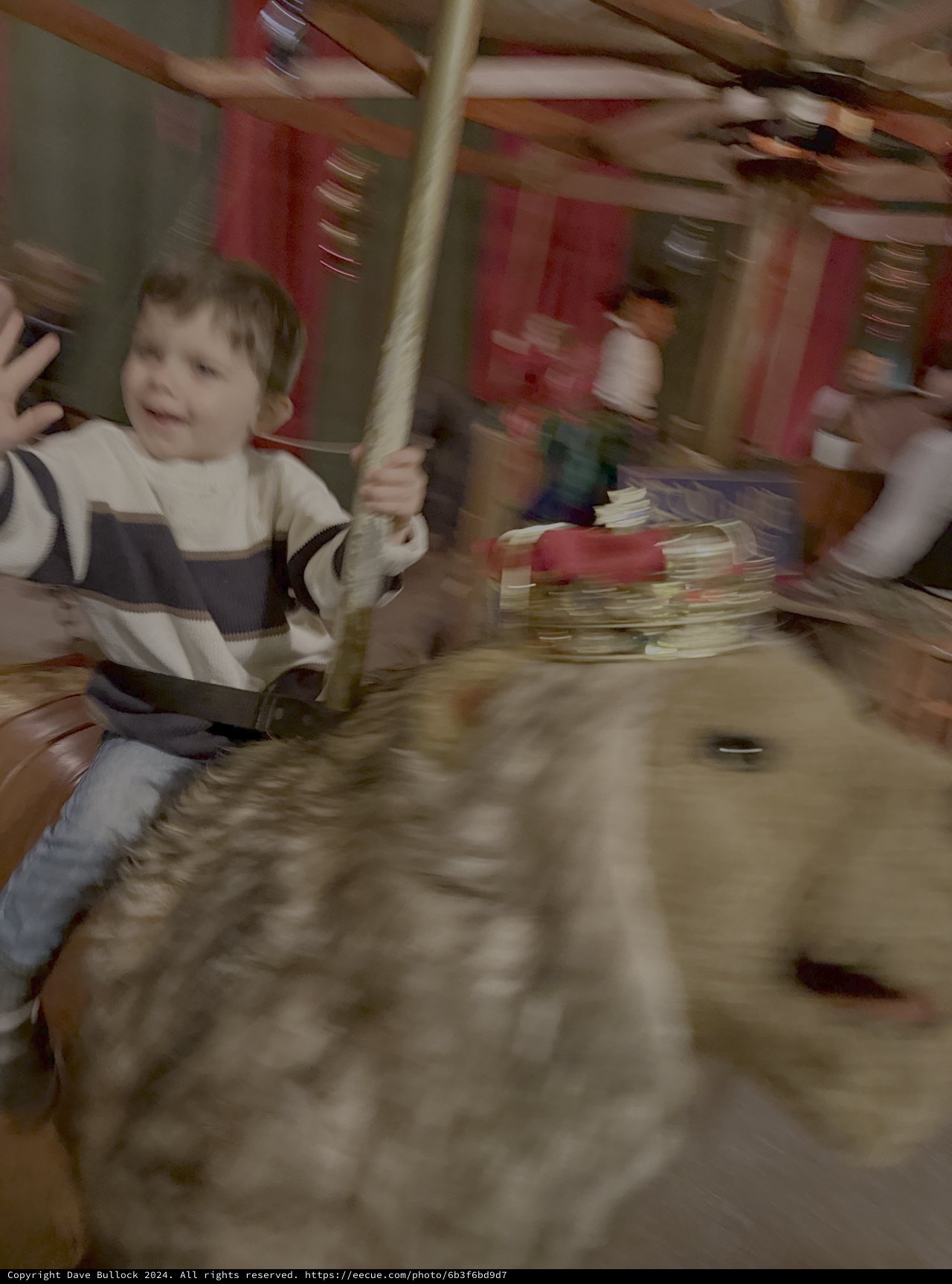 Motion Blur Carousel Ride with Children