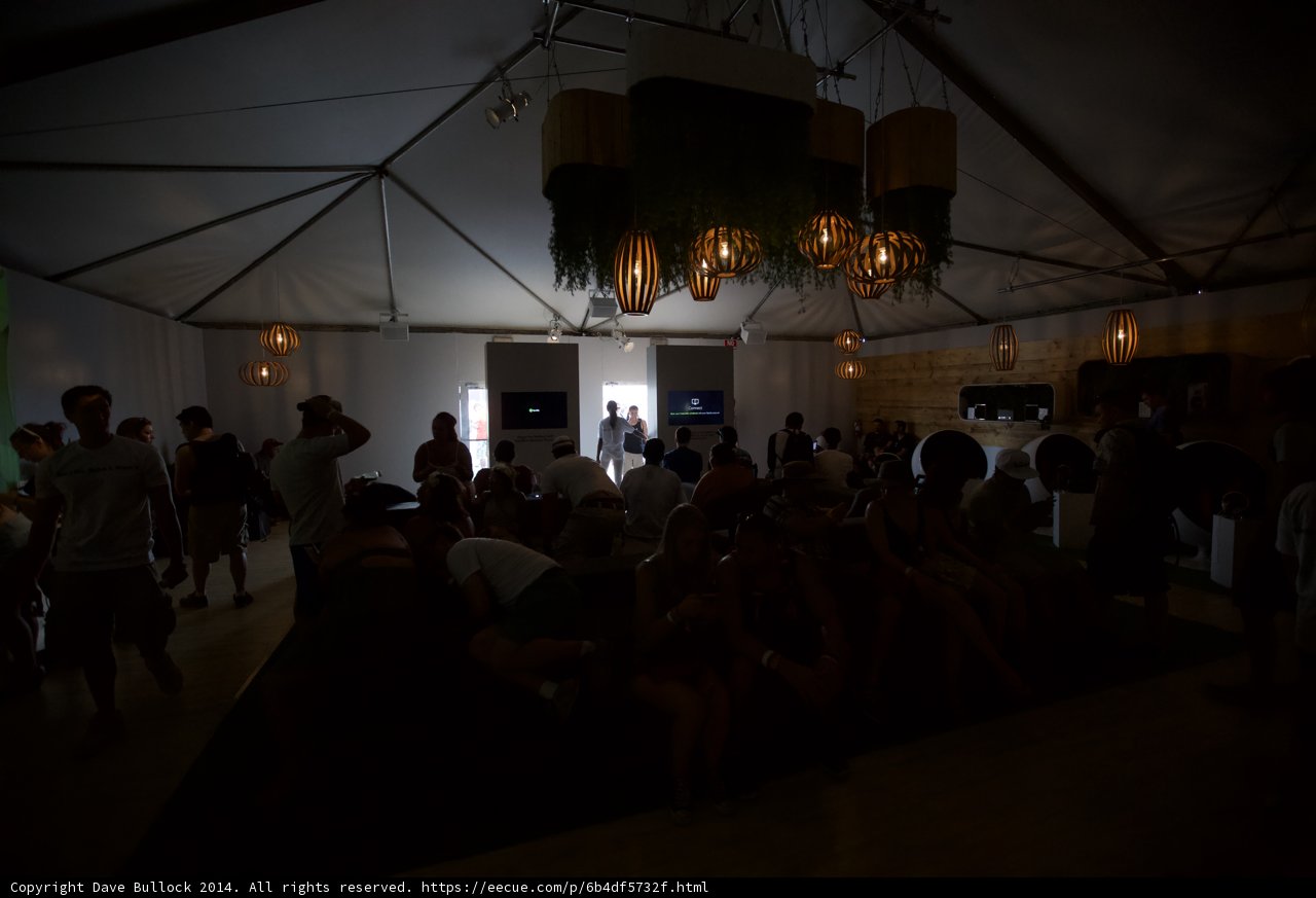 Chandelier Shines over Crowded Tent