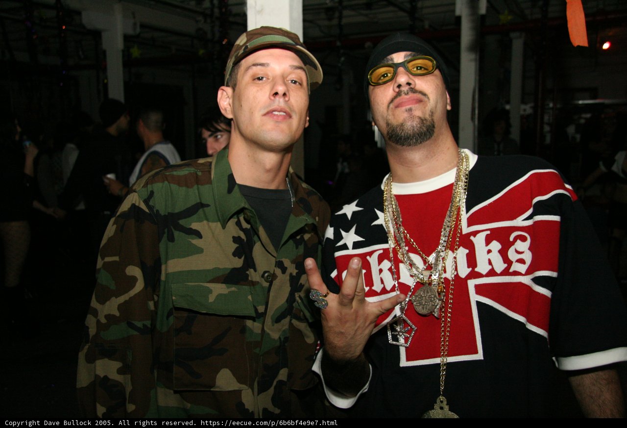 Camouflaged Men Strike a Pose