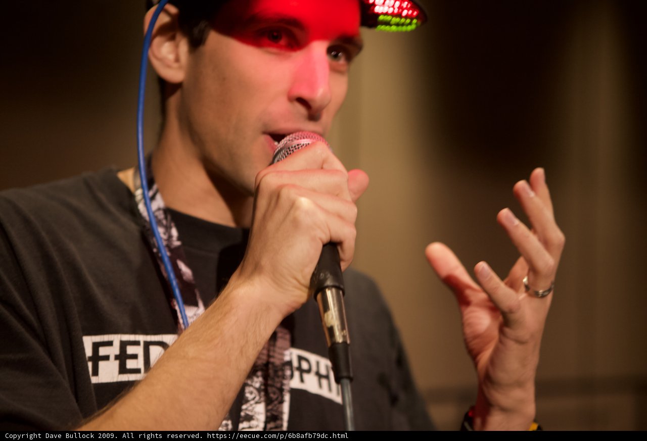 Black Shirted Singer with Microphone