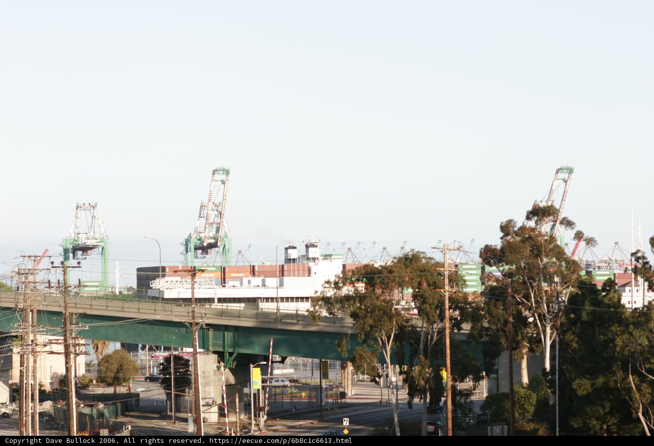 Towering Bridge over a Bustling Port