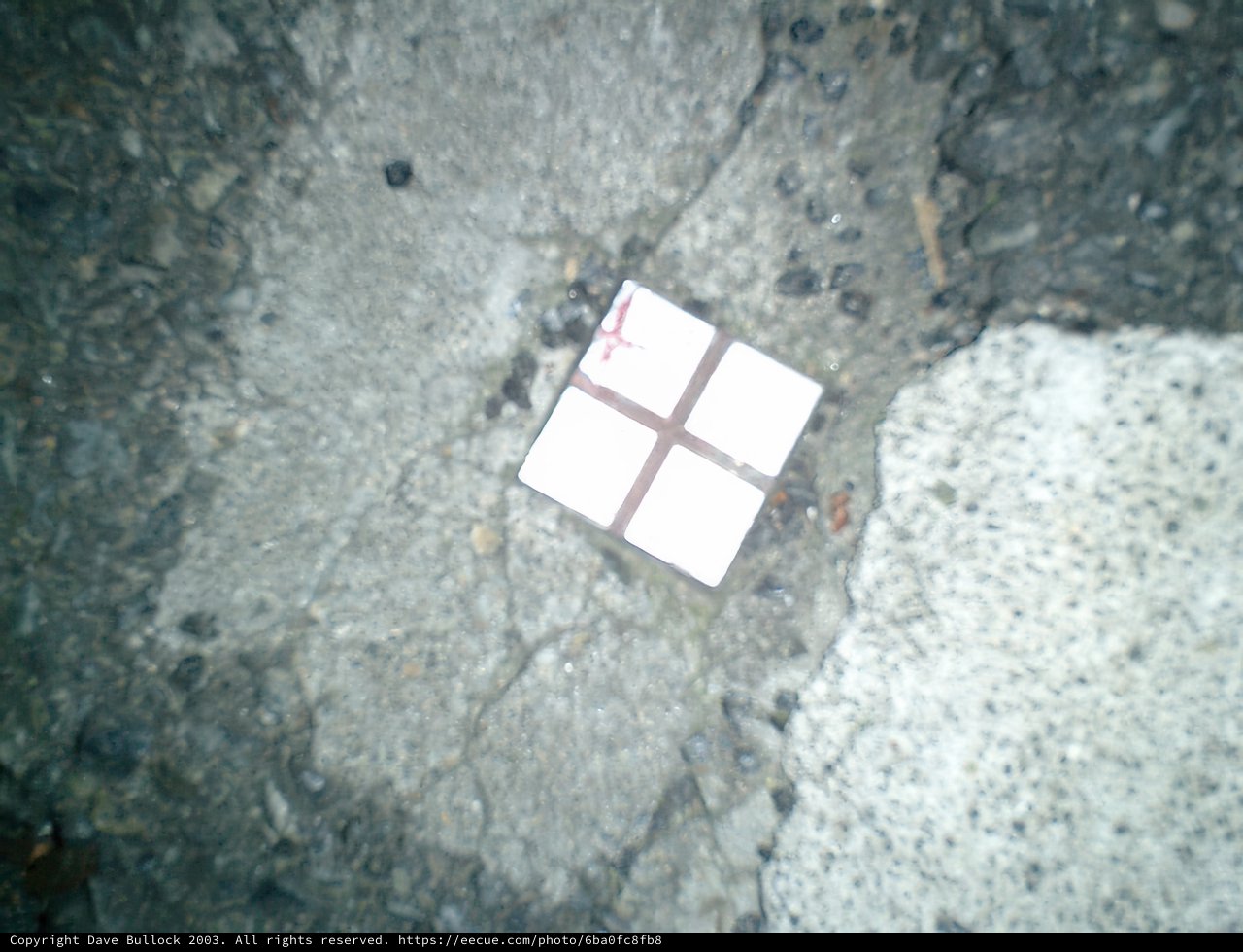 Square Paper amidst Slate Path