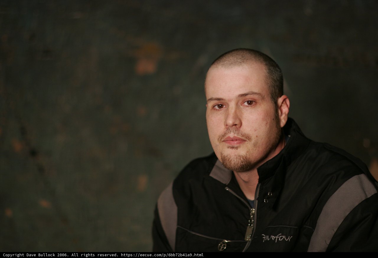 Shaved Head and Black Jacket
