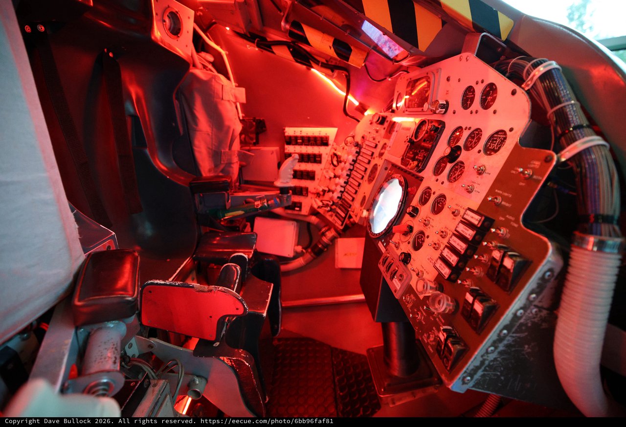 Interior of Historic Aircraft Cockpit with Red Lighting