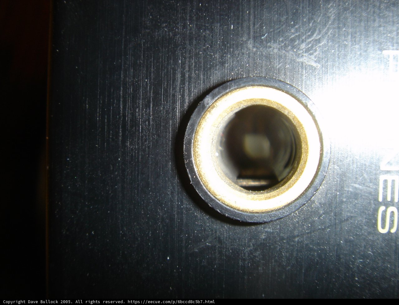 Shiny Metal Device with Gold Ring
