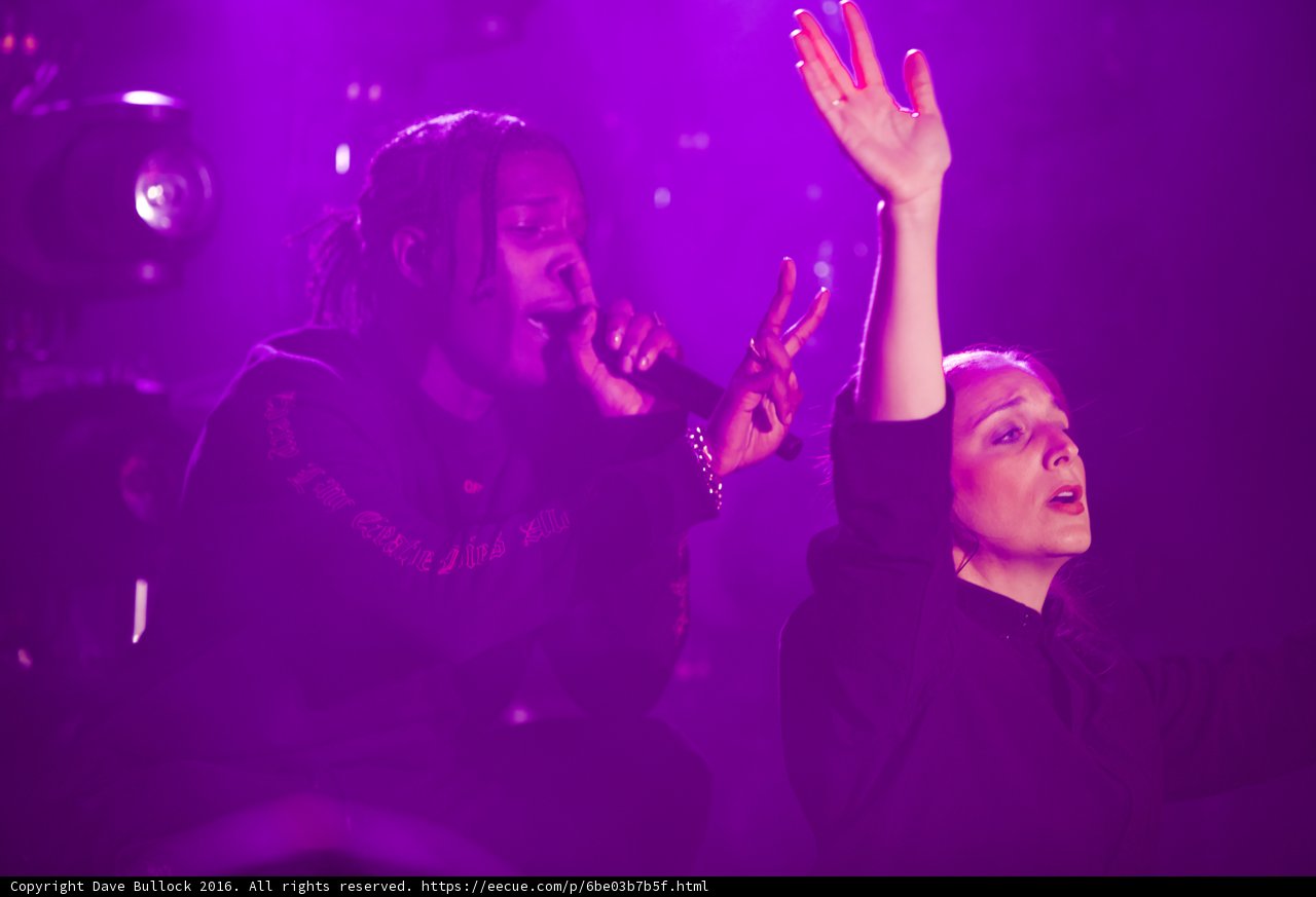Moving the Crowd Caption: A$AP Rocky performs as Anna Bentley raises her hands in excitement during their electrifying night club concert for Coachella 2016.