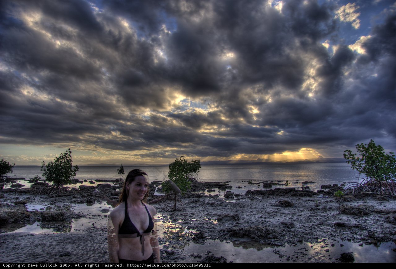 Storm Clouds Over Fiji Coastline at Sunrise