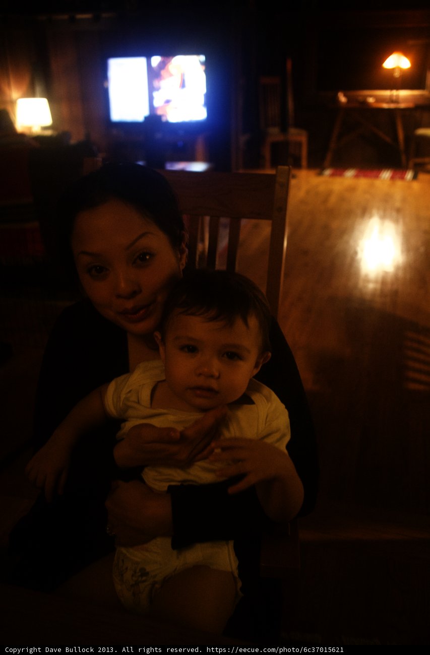 Mother and Child in a Cozy Room Filled with Technology