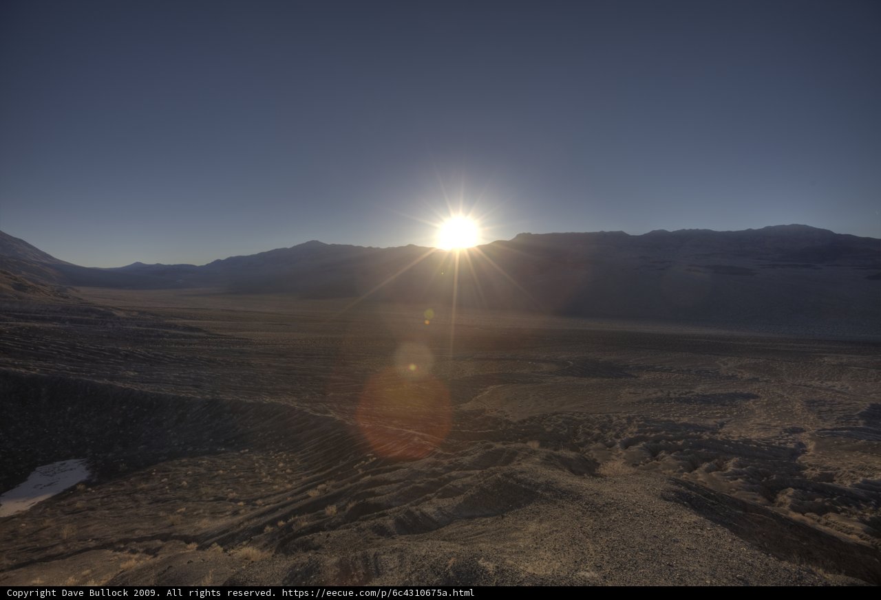 Majestic Mountain Range Under the Glowing Sun