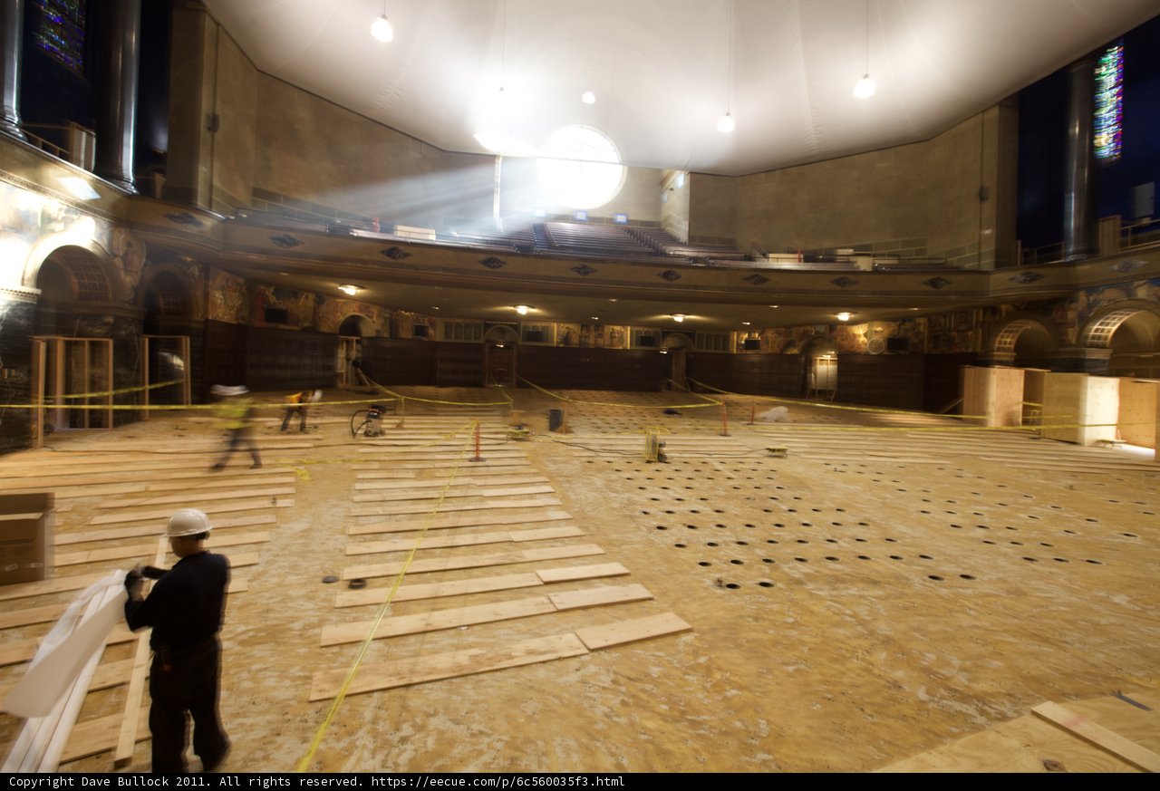 Construction workers hard at work on new floor