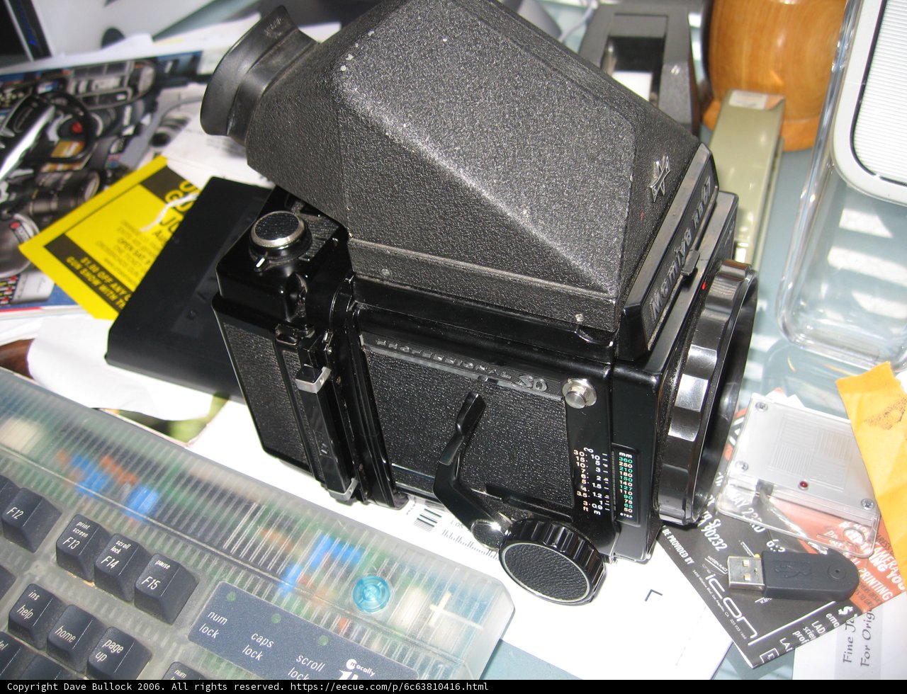 Digital Camera and Computer Hardware on Desk