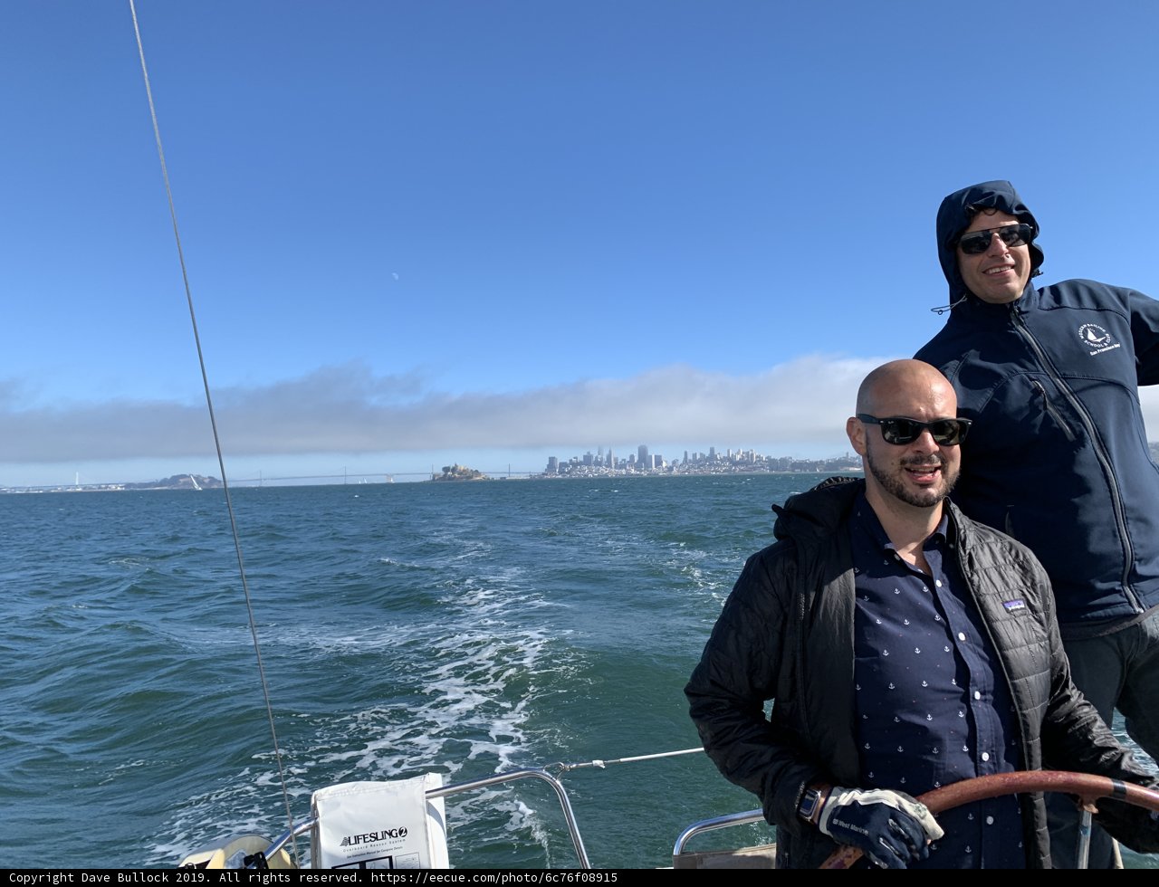 Two Men Fishing in the Shadow of San Francisco