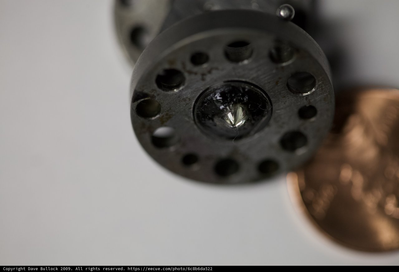 Close-up of Penny and Metal Object