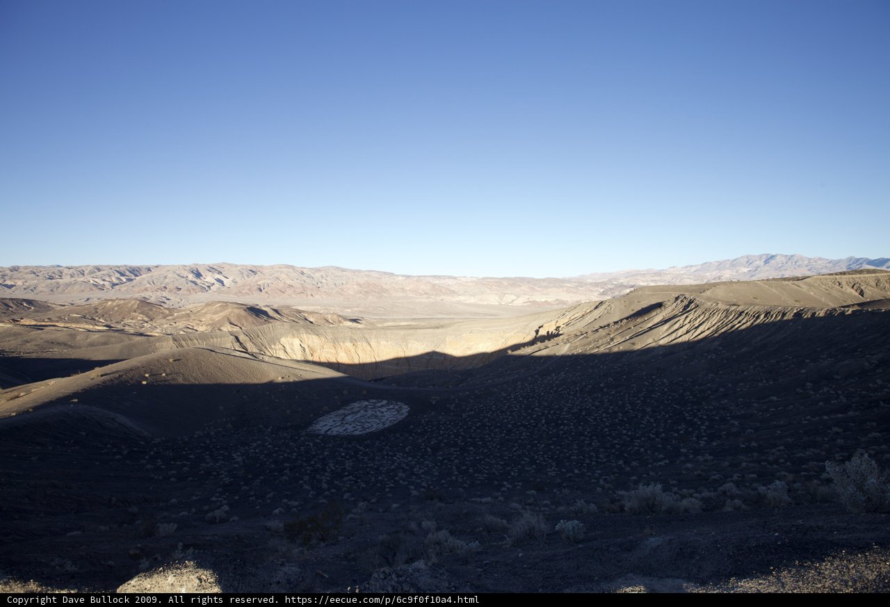 Majestic Mountains Meet Endless Desert Plateau