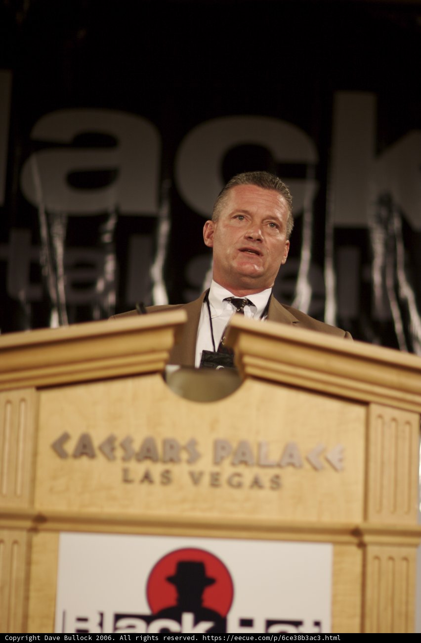Public Speaking in a Suit and Black Hat