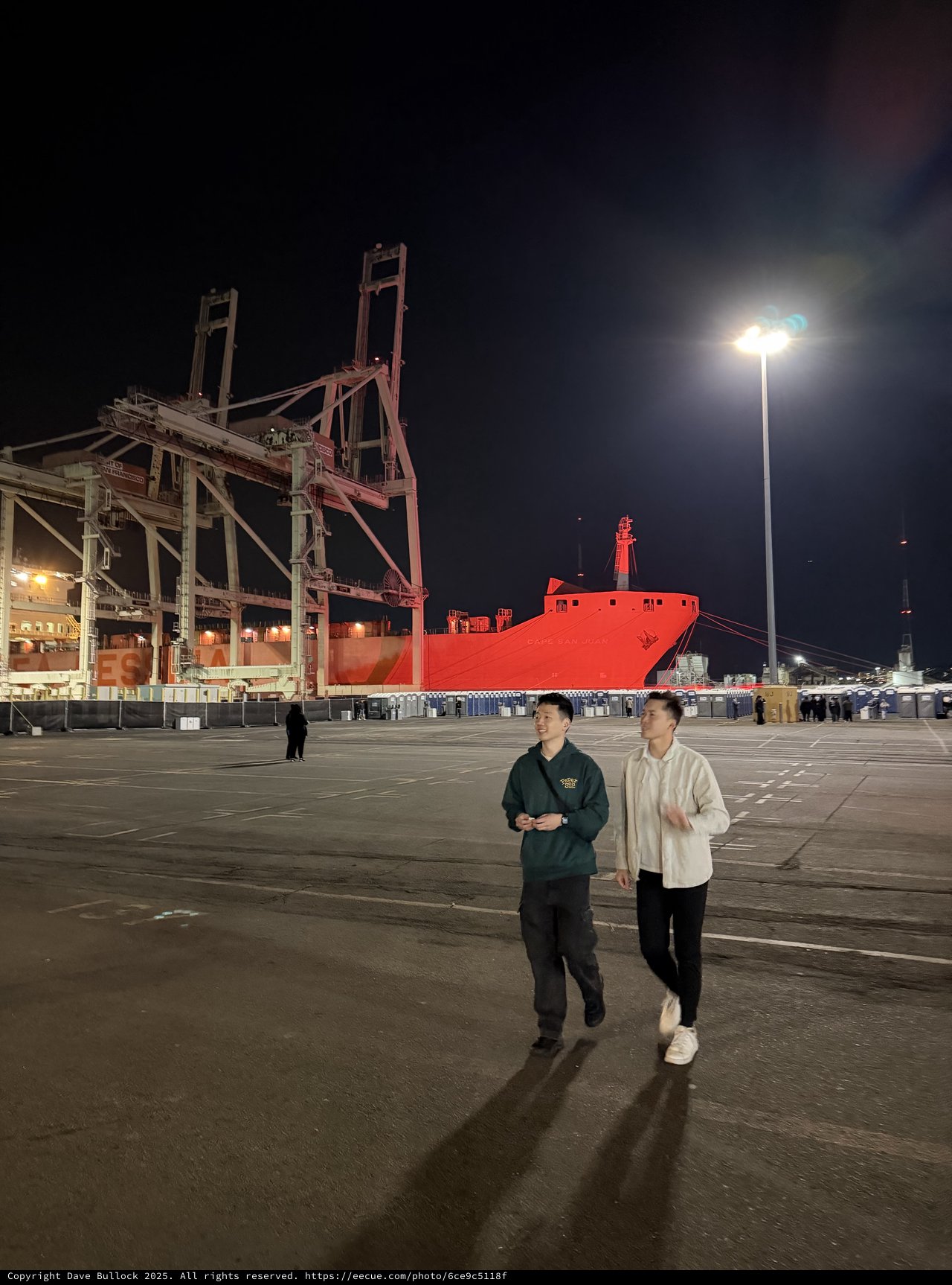 Night Stroll at Industrial Port with Red Ship