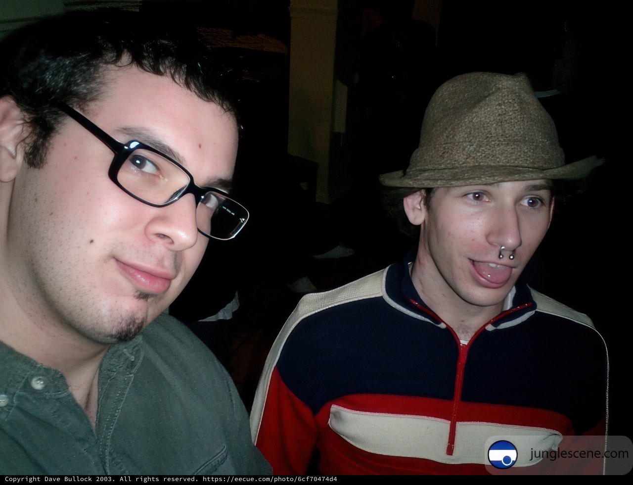 Three Men with Glasses and Hats