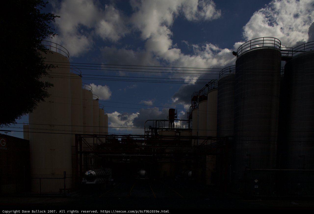 Moody Sky Over Industrial Buildings