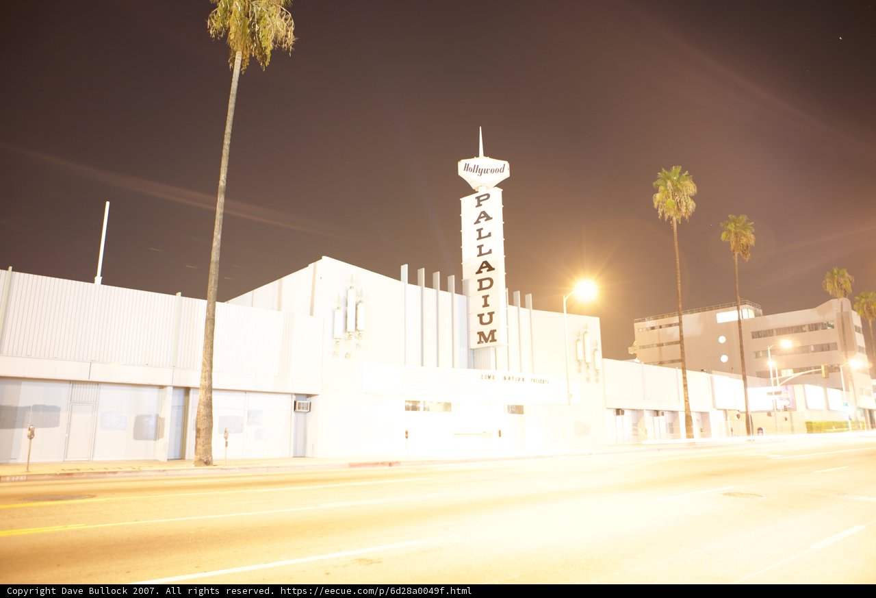 Towering Office Building in the Night Sky