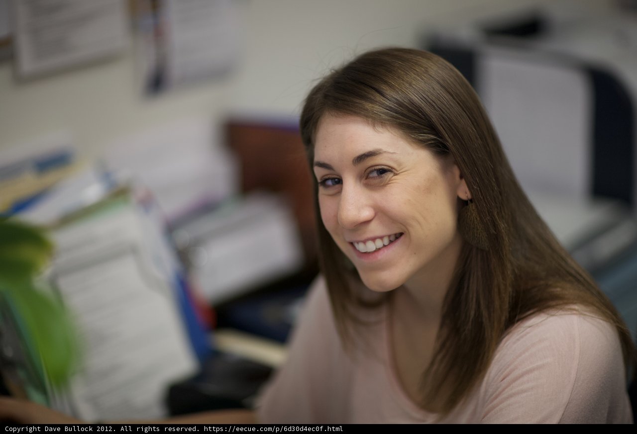 Happy Woman at Her Desk