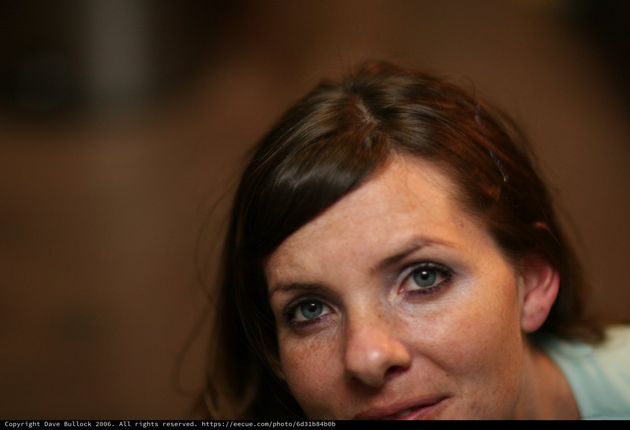 Penelope: Intimate Portrait with Striking Blue Eyes