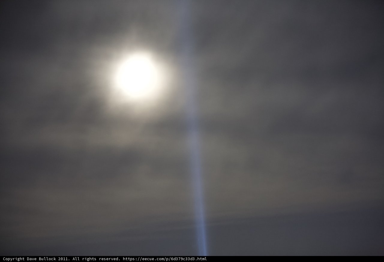 Sun's Flare through Wispy Clouds