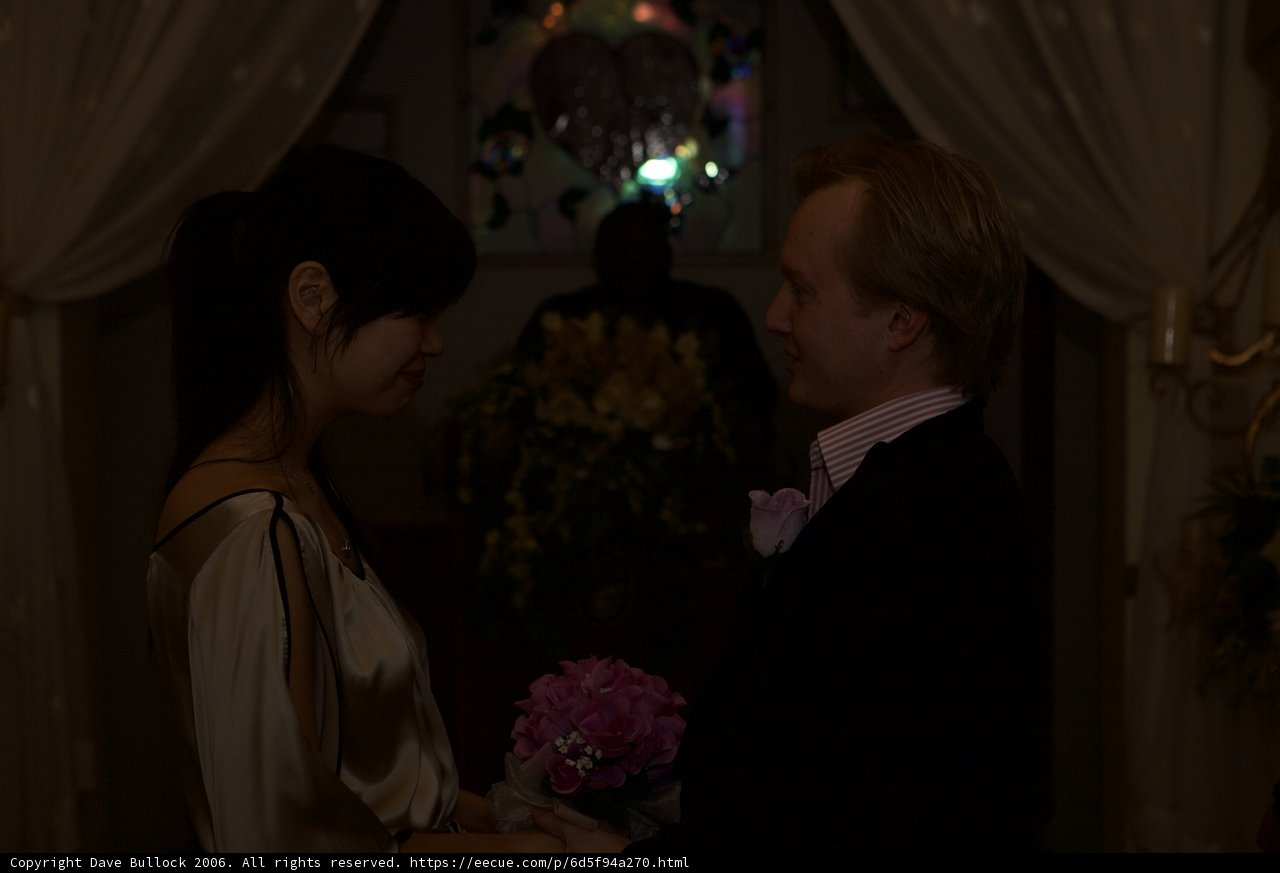 The Happy Couple with a Beautiful Flower Bouquet