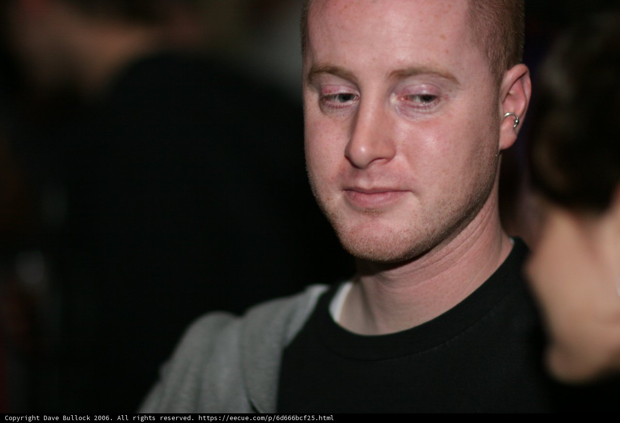 Red-Haired Man in Black Shirt