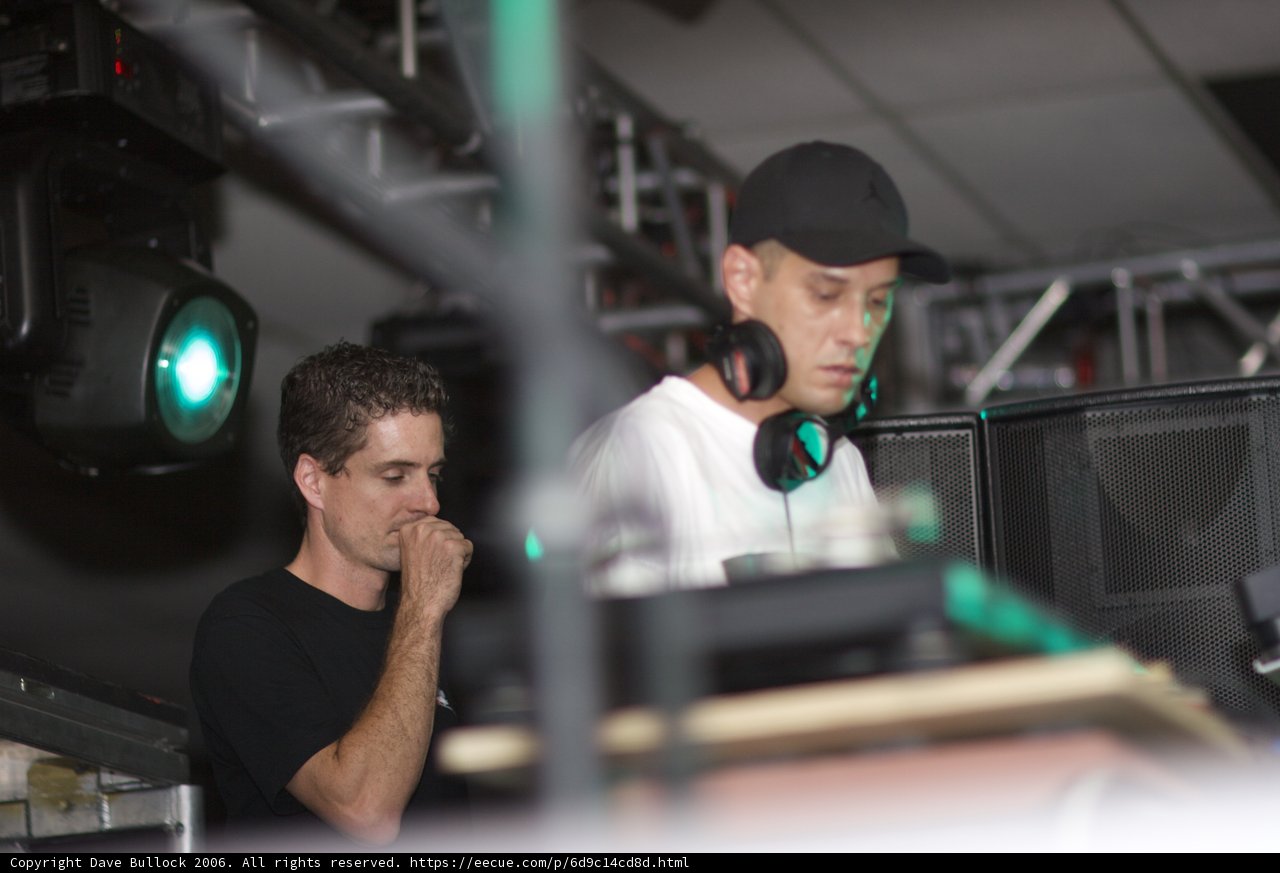 Two Men Grooving to the Beats