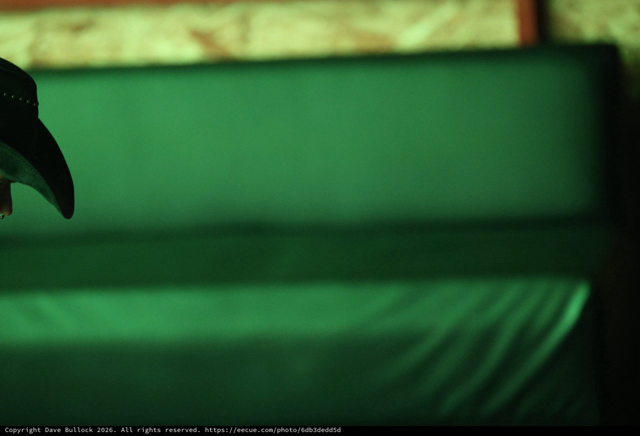 Green Felt Pool Table Rails in Dramatic Shadow