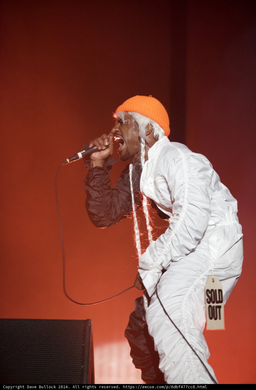Entertainer in White and Orange Performs at Coachella