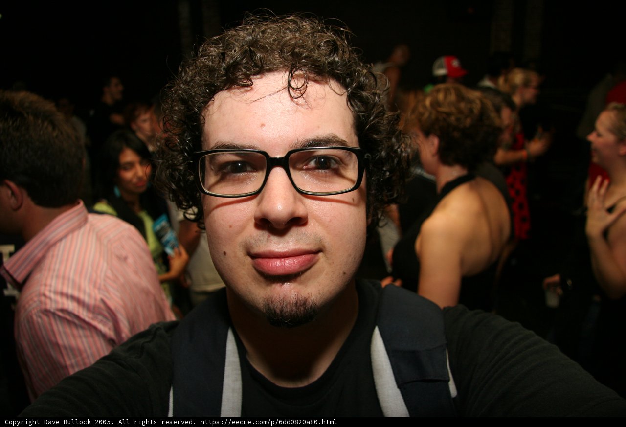 Curly Haired Dave B in the Nightlife Crowd