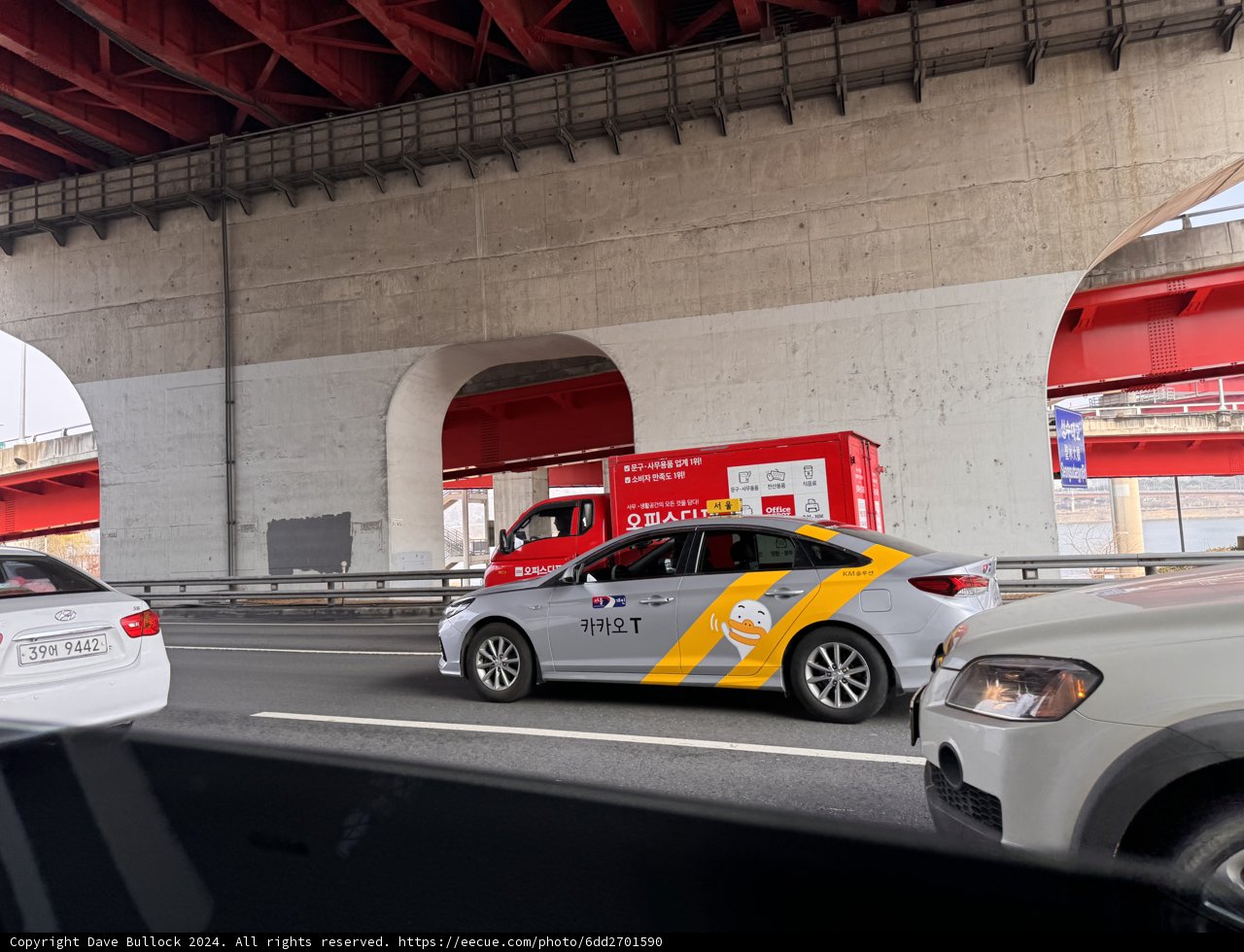 The Red Arch Passage: Automotive Symphony in Seoul