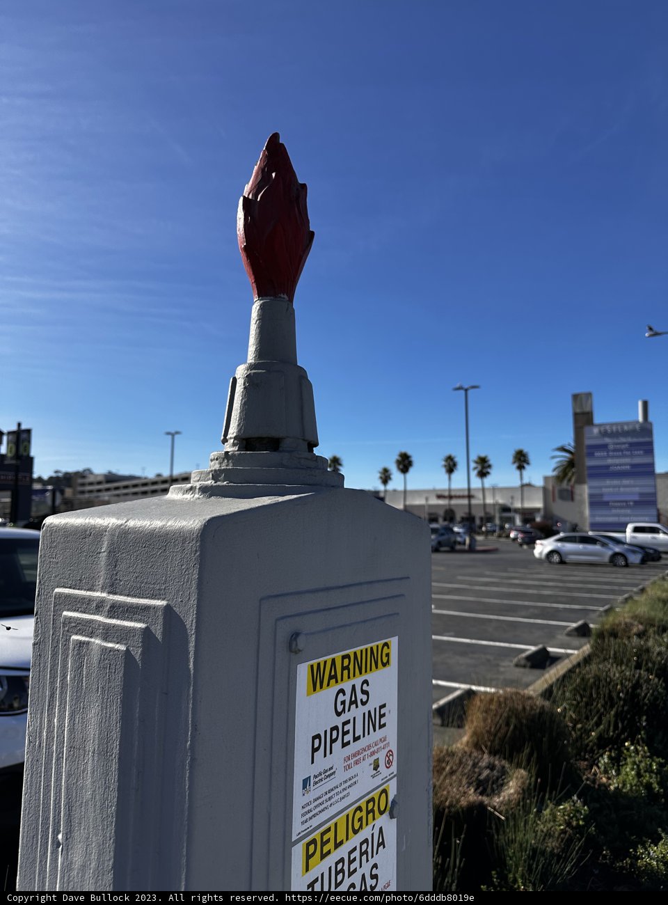 Red and White Sign on a City Corner