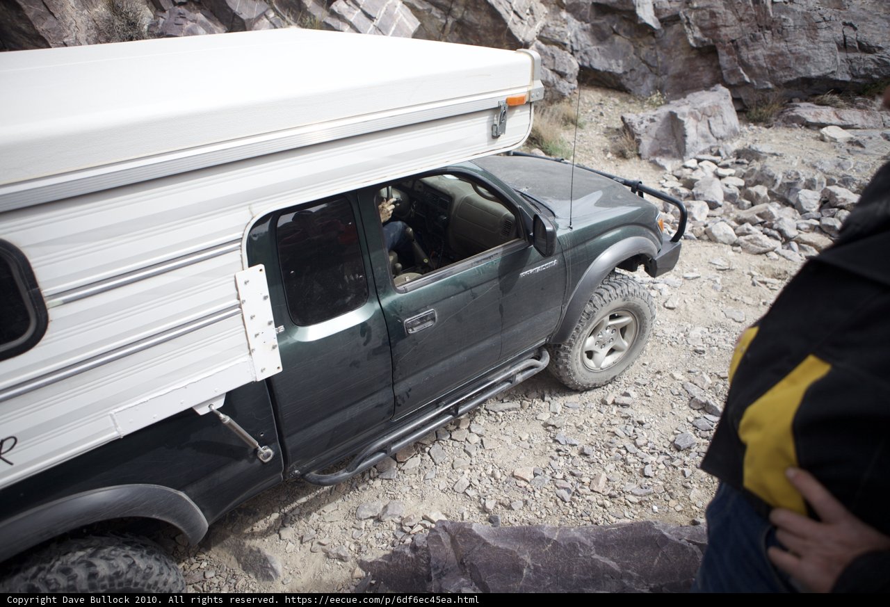Adventurous Camper on a Pickup Truck