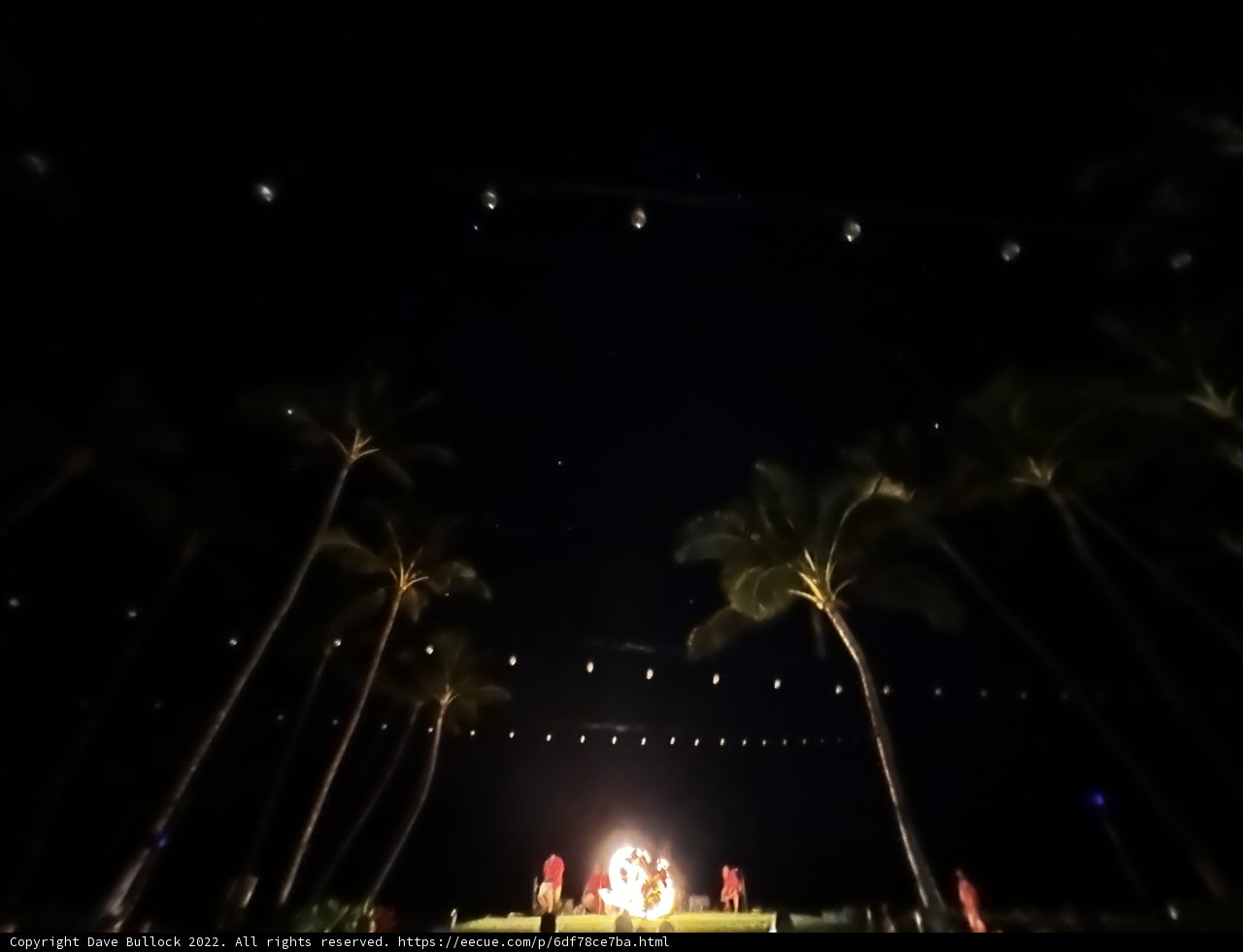 A Nighttime Gathering around a Roaring Bonfire