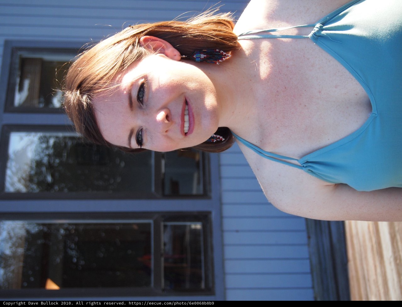 Smiling Redhead in Blue Bikini Top Outdoors