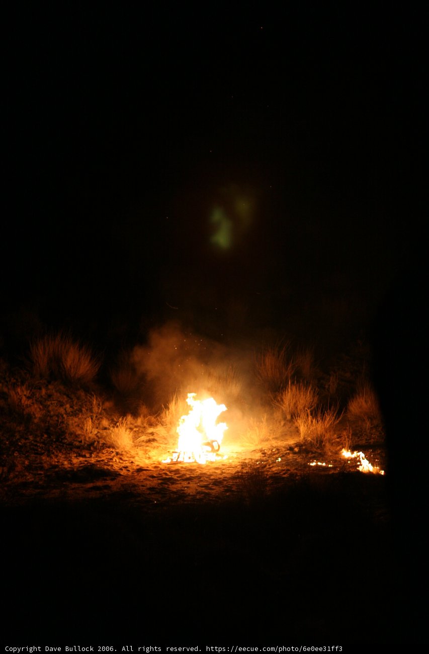 Green Fire Illuminates the Night Sky
