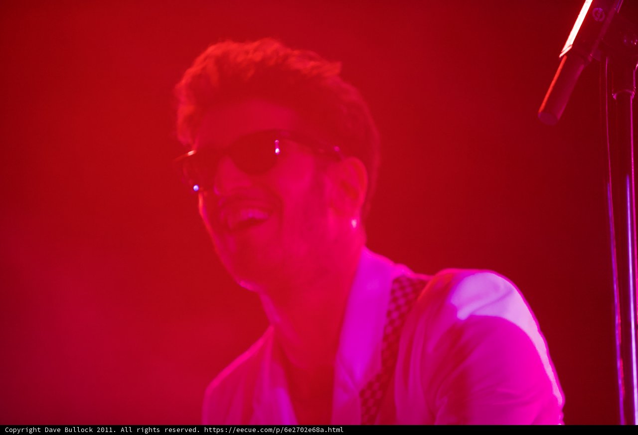 Smiling Musician Shines on Stage