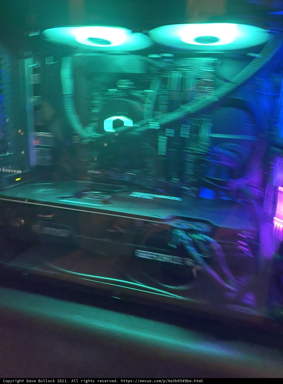 Green Light Illuminates Computer Case in Urban Night Club