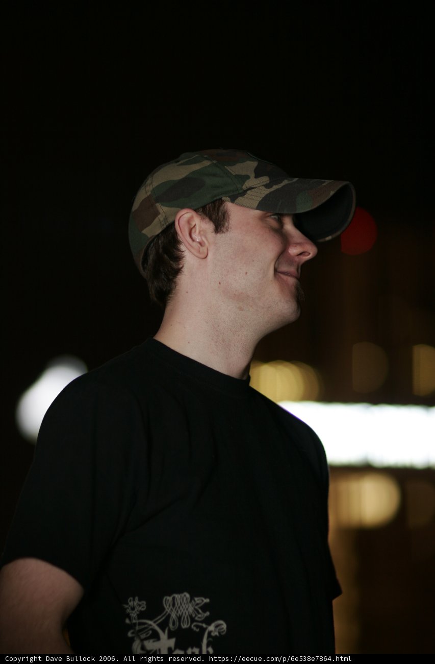 Man in Baseball Cap and Sunglasses