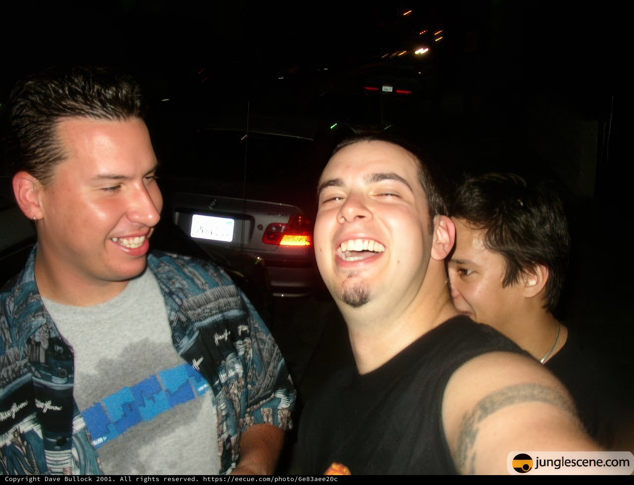 Two Men Laughing at a Party