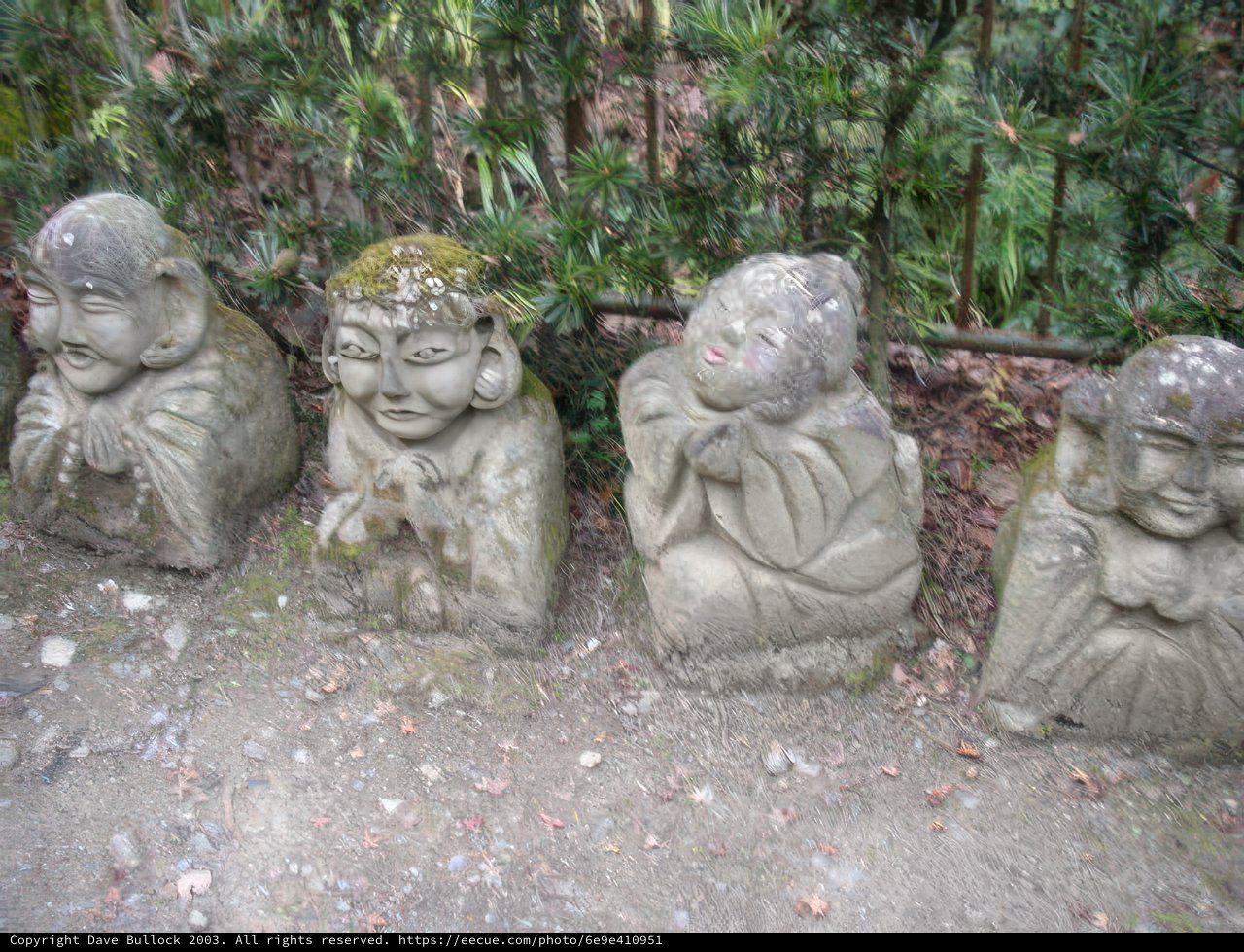 Smiling Stone Statues at Kyoto City Hall