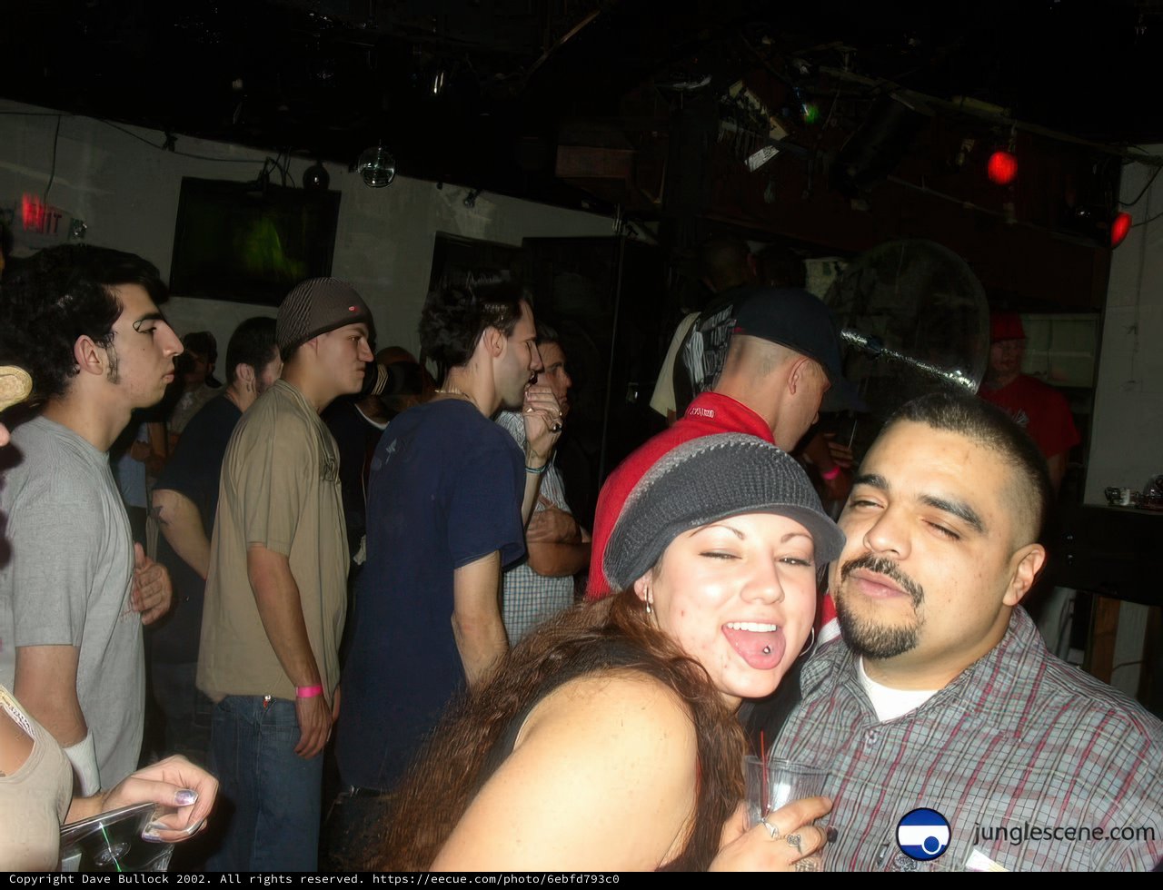 Partygoers Strike a Pose at the Nightclub