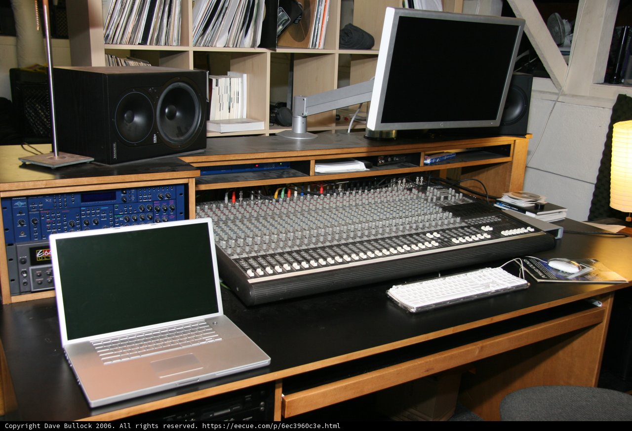 Black Desk with Computer Setup and Speakers