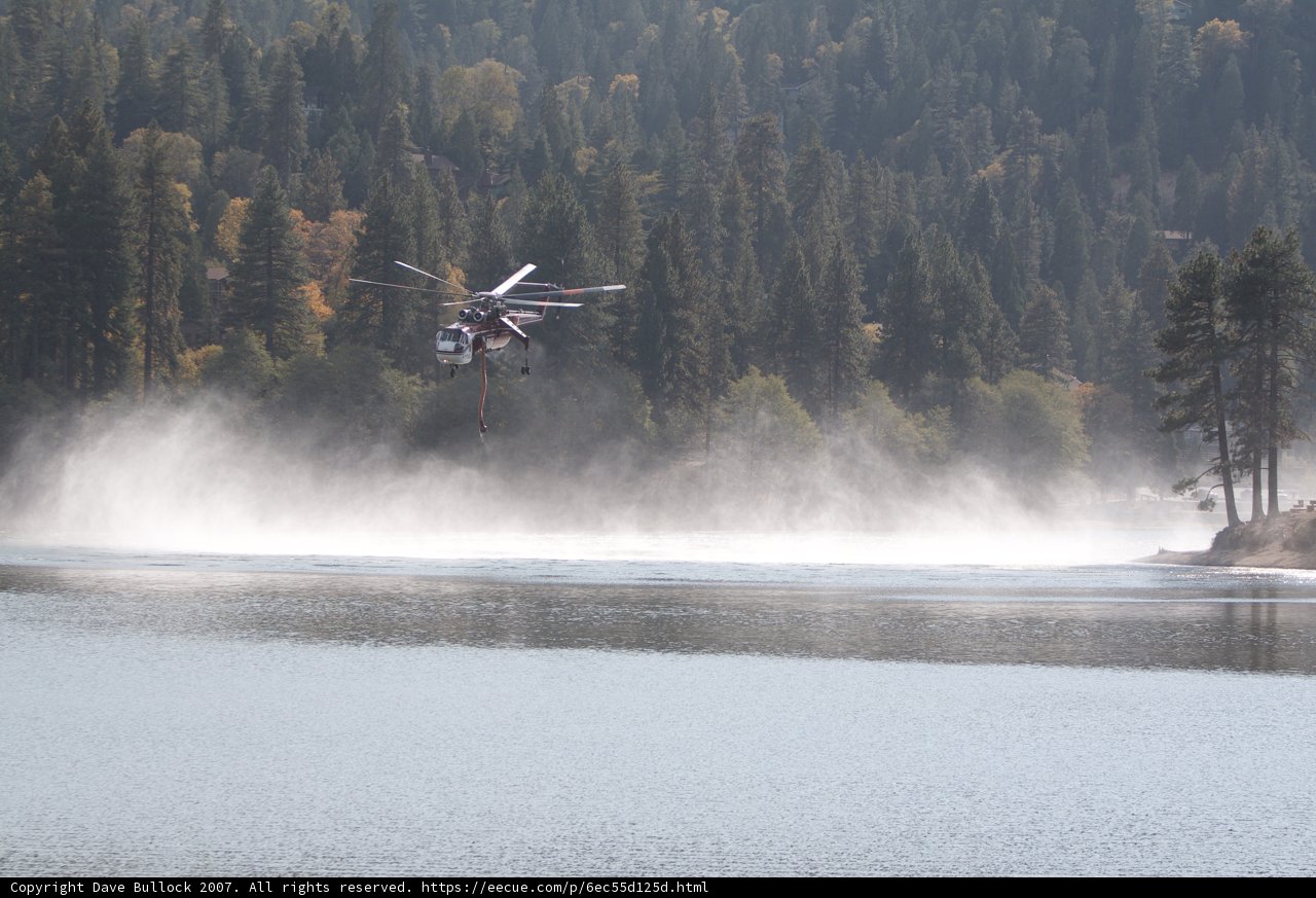 Helicopter and Fire Truck Fly Over Lake