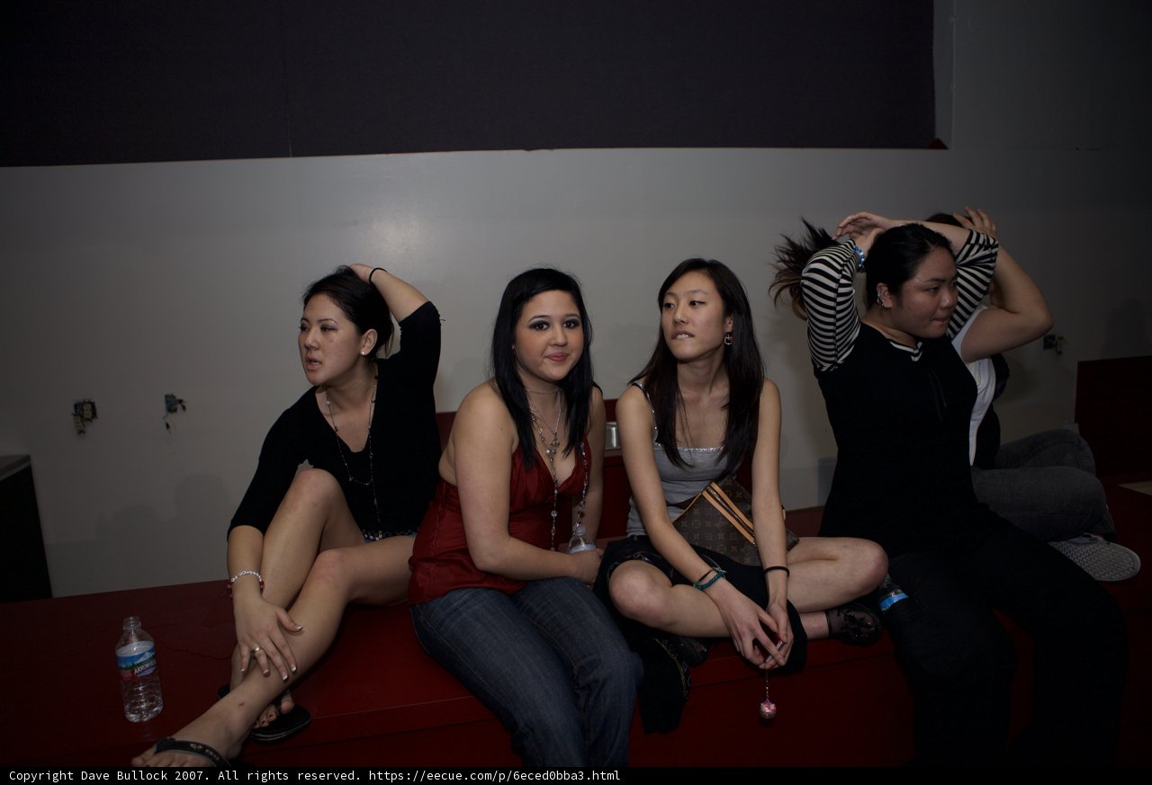 Four Women Relaxing on a Luxurious Sofa
