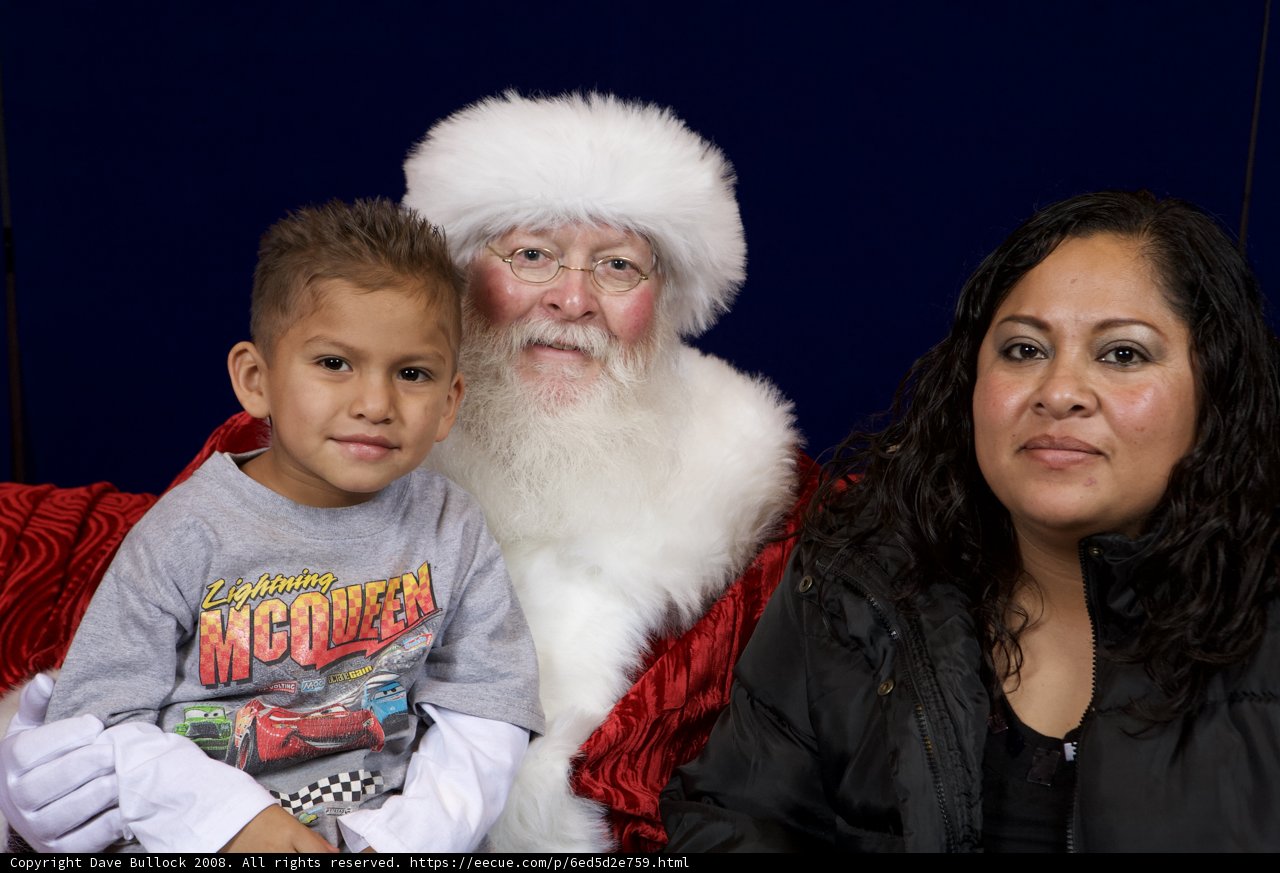 Santa Claus Brings Joy to Mother and Child